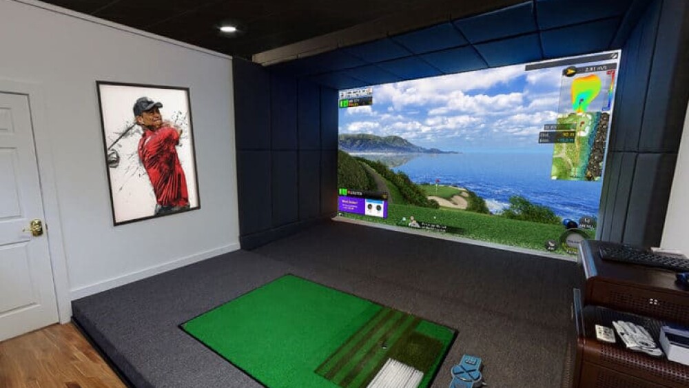 Residential Home Buildout Golfzon Golf Simulator with Tiger Woods Poster in Background