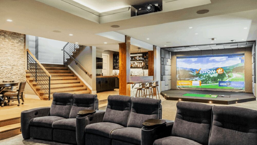 Residential Buildout With Projector and Movie Theatre Set Up and Golfzon Golf Simulator in Background