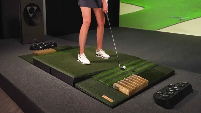 Ashlan Ramsey Standing on a Motion Plate on a TwoVisionNX, Moving Floor