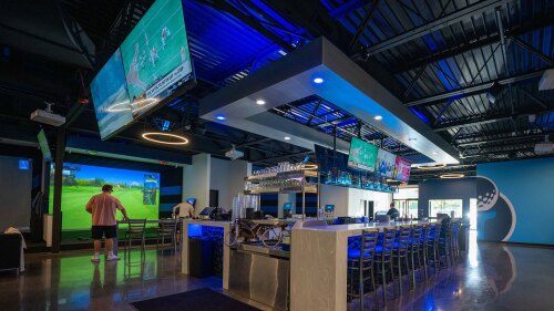 TVs, Bar, and Simulator at Tee Times