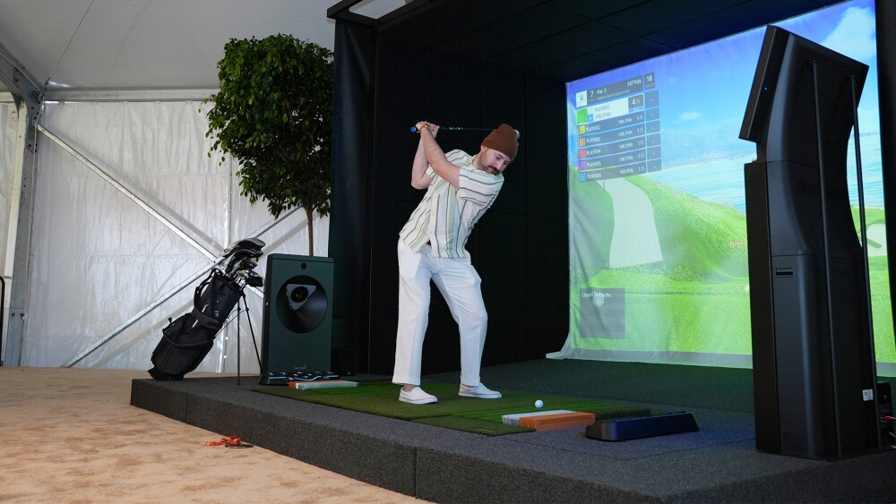 Man Swinging at Pebble Beach Activation