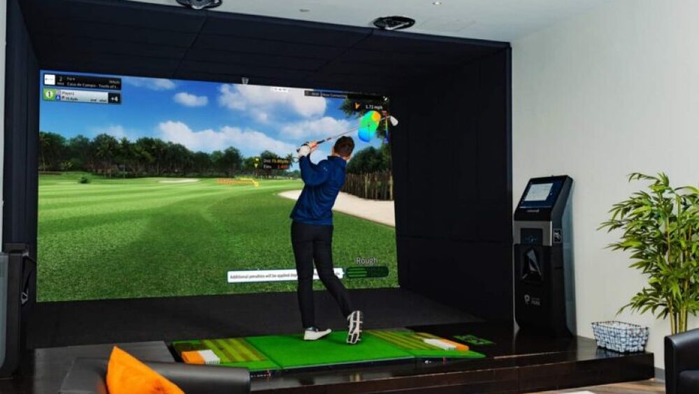 Golfer Swing on Golfzon TwoVision Moving Plate with Couches in Background