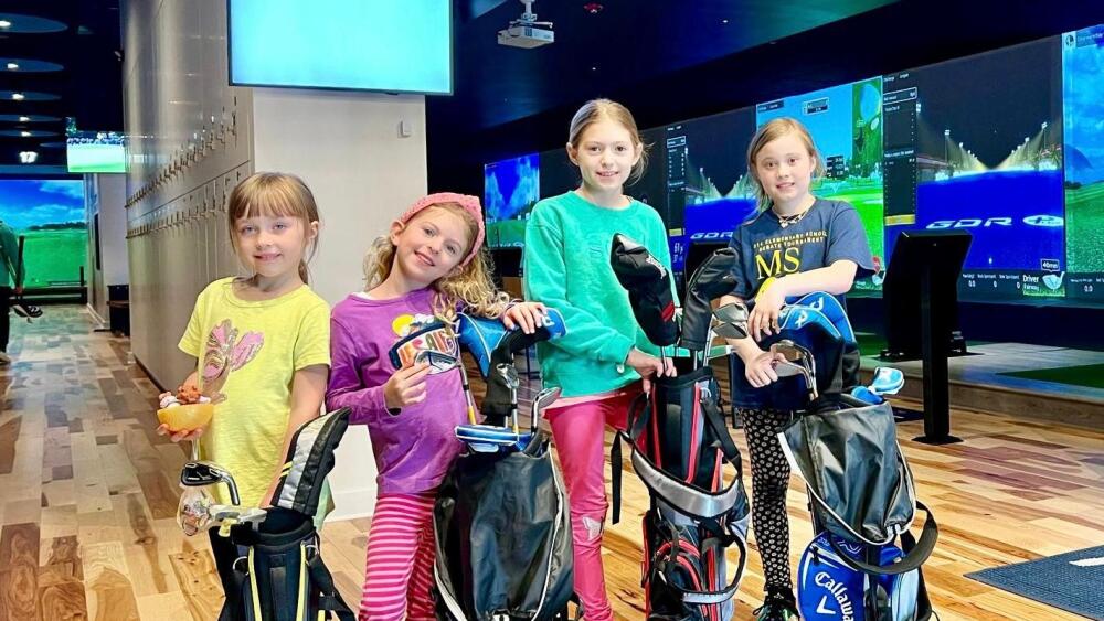 Junior Kids Female Golfers Golfzon Range Westbury Summer Camps