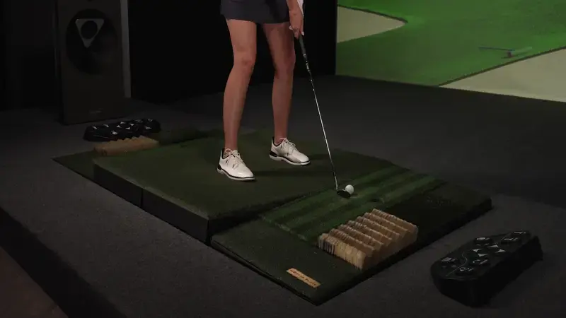 Ashlan Ramsey Standing on a Motion Plate on a TwoVisionNX, Moving Floor