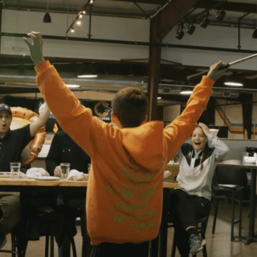 Group of Golfers Celebrating After Good Shot, Walt Reillys Celebration Event Group