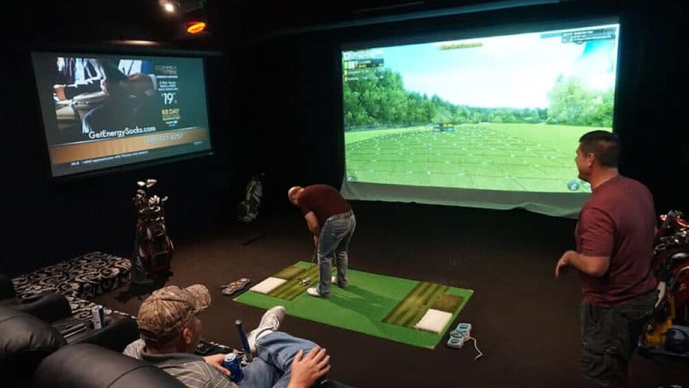 Golfers in Man Cave on GOLFZON Vision Simulator