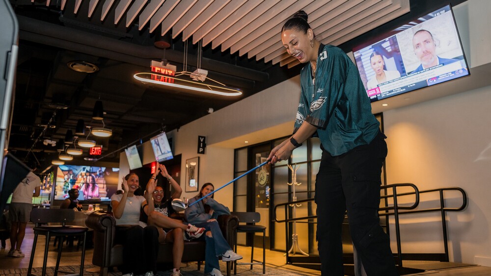 Group of women enjoying themselves at GOLFZON Social