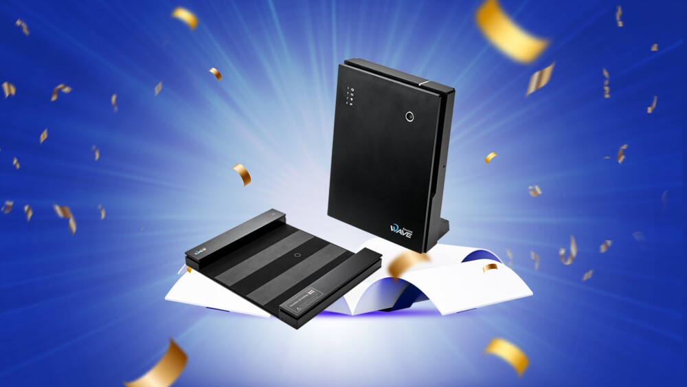 Go Wave, GOLFZON Wave Prize - GOLFZON Wave Launch Monitor and Putting Mat on opened gift box with confetti exploding around it on blue background