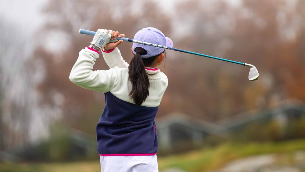 Junior Female Girl Golfer Swining on Black Bear Golf Club Leadbetter Junior Tournament