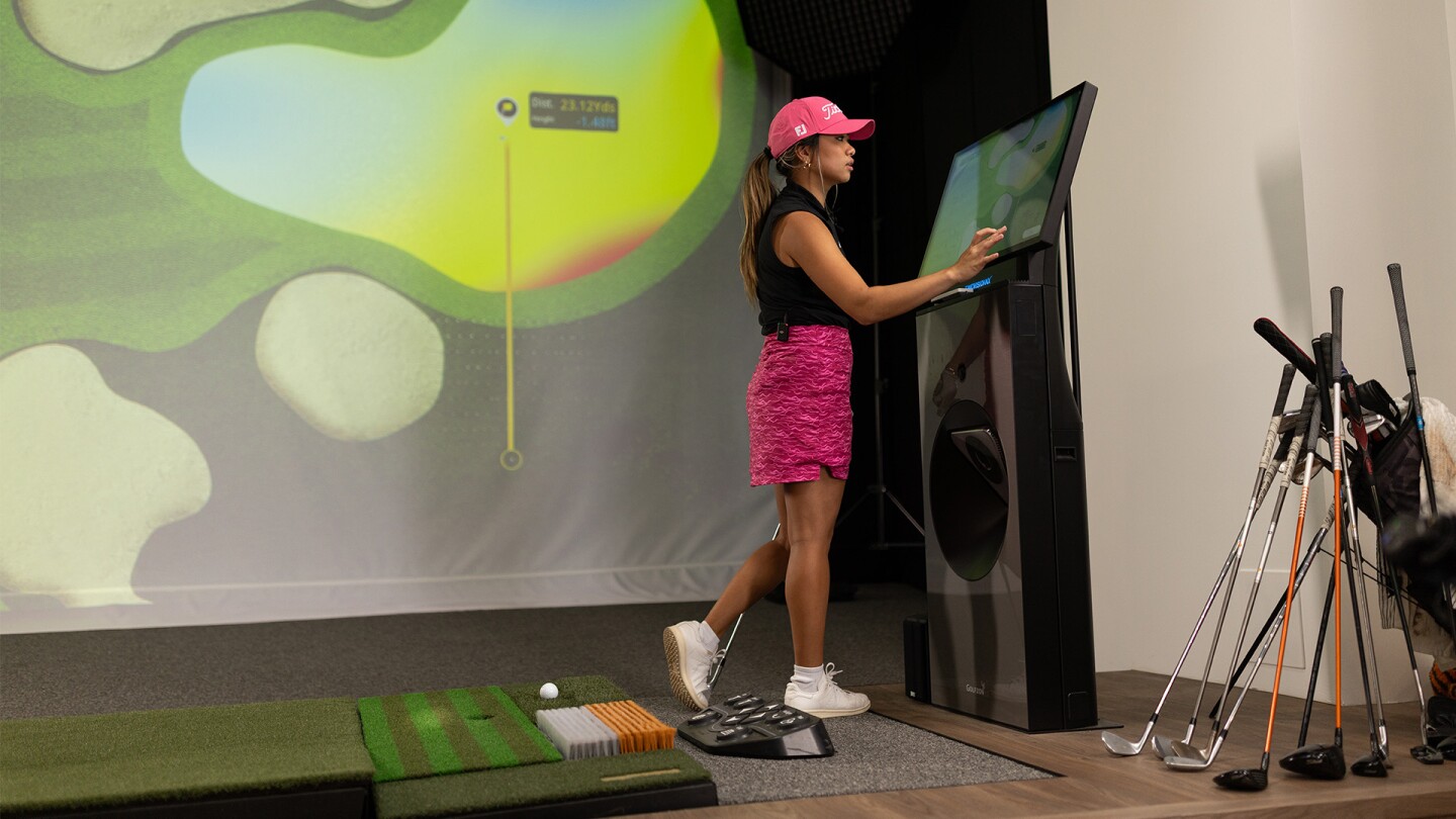Catherine Rao using the TwoVisionNX Kiosk