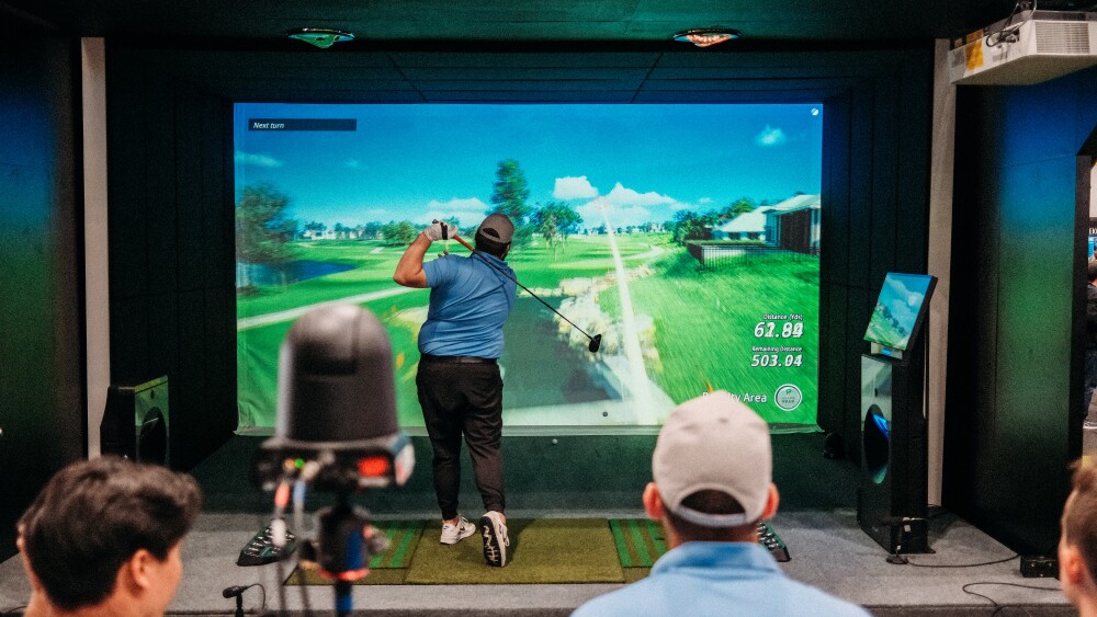 Man hitting on the TwoVisionNX during the GOLFZON Tour Finals