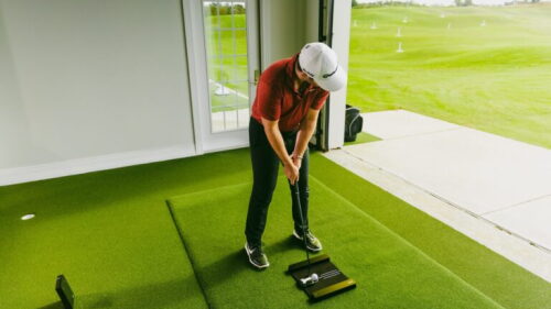 Golfer Putting Golfzon Wave Launch Monitor