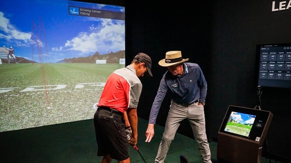David Leadbetter Instruction, Leadbetter Bay, Male Golfer Taking Lesson GDR