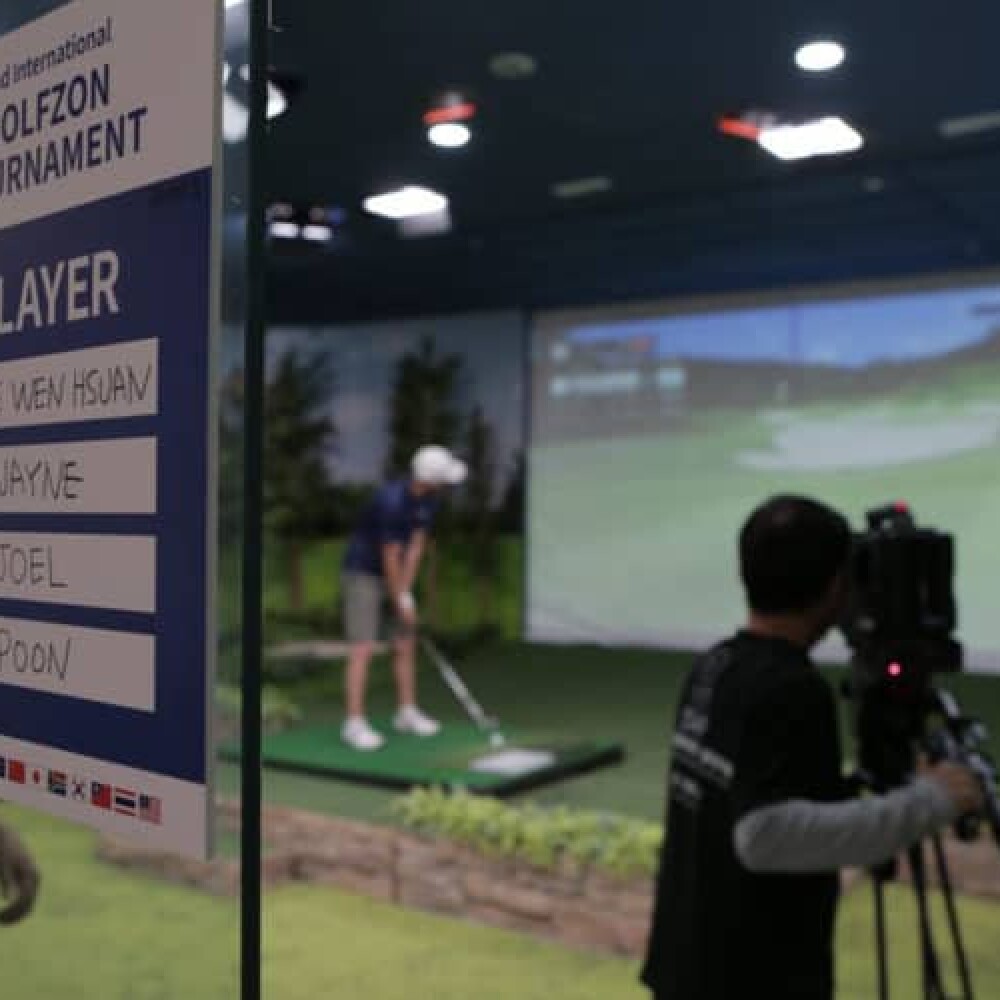 Camera Taping Player Playing on Golfzon Simulator - 3rd International Golfzon Tournament