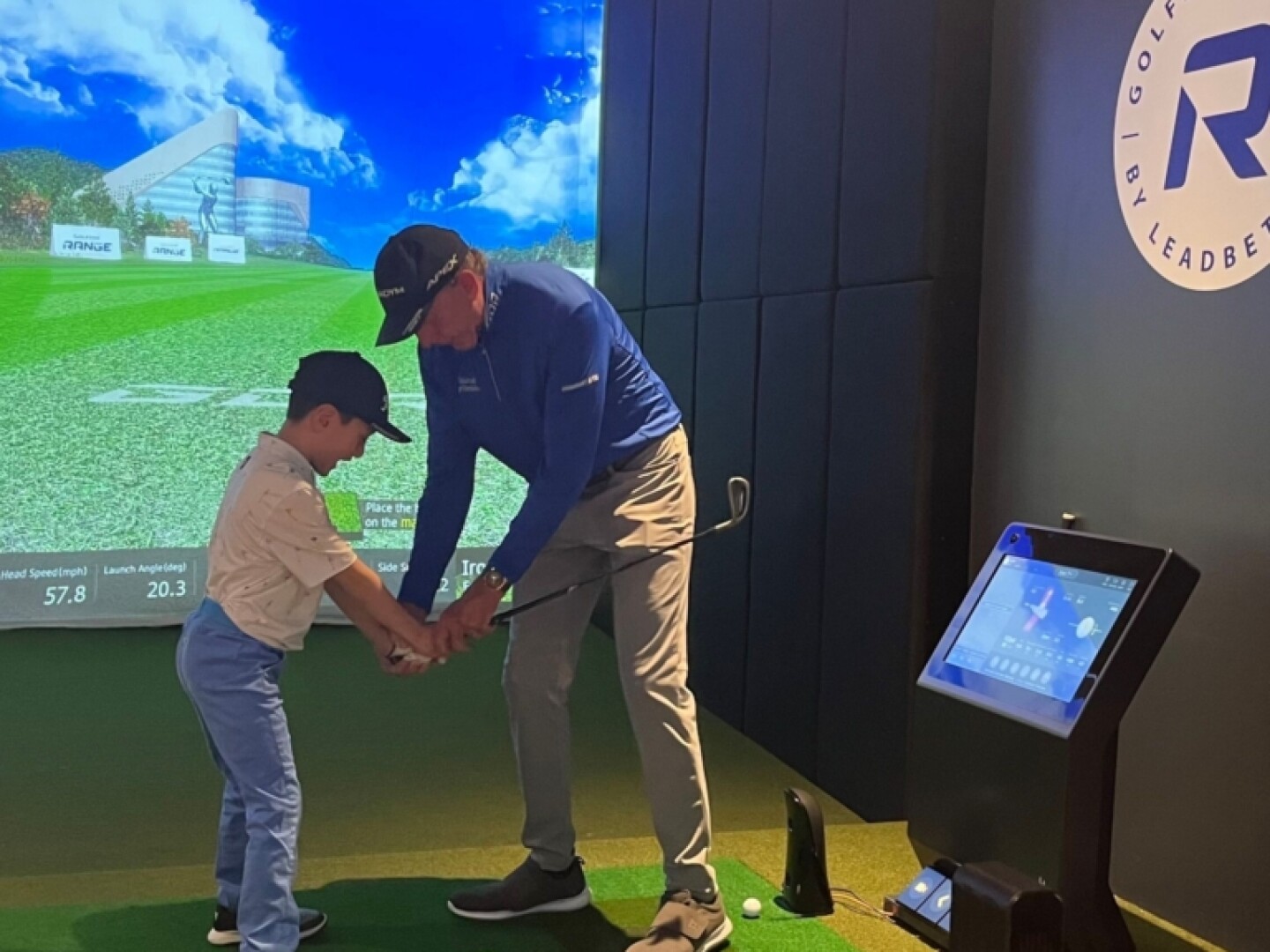 child kid junior golfer learning how to golf hold golf club with david leadbetter