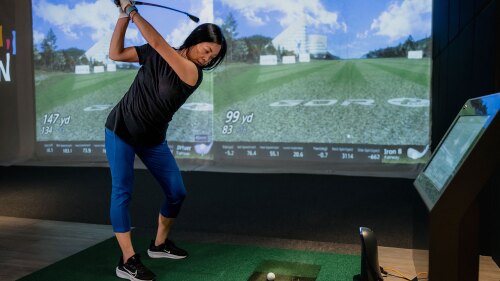 Woman Golfer on GDR Plus at GOLFZON Range