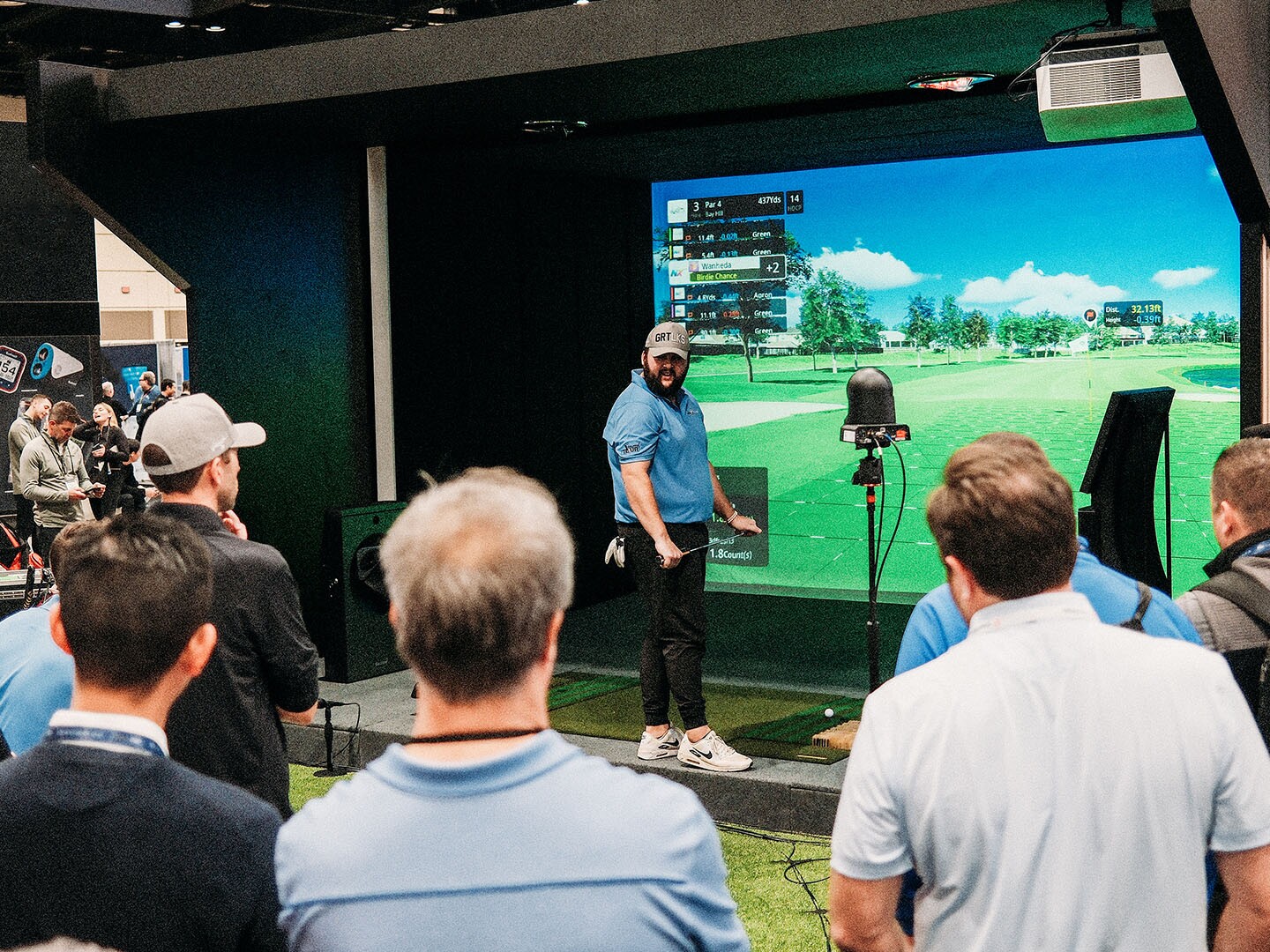 Detroit player looking at his team mates for advice before he putts