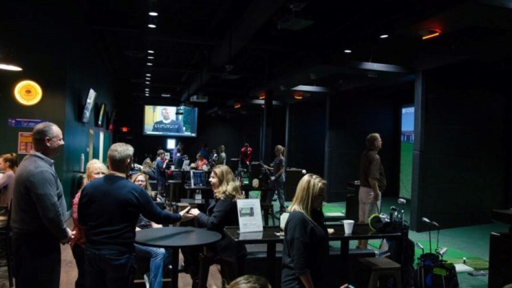 Busy, Full, Crowded Business with Golfzon Golf Simulators, TV