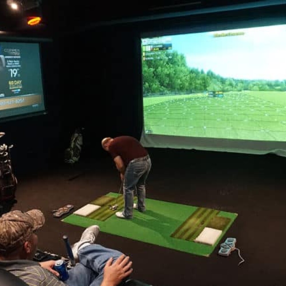 Three Male Golfers in Golfzon Golf Simulator Man Cave Vision