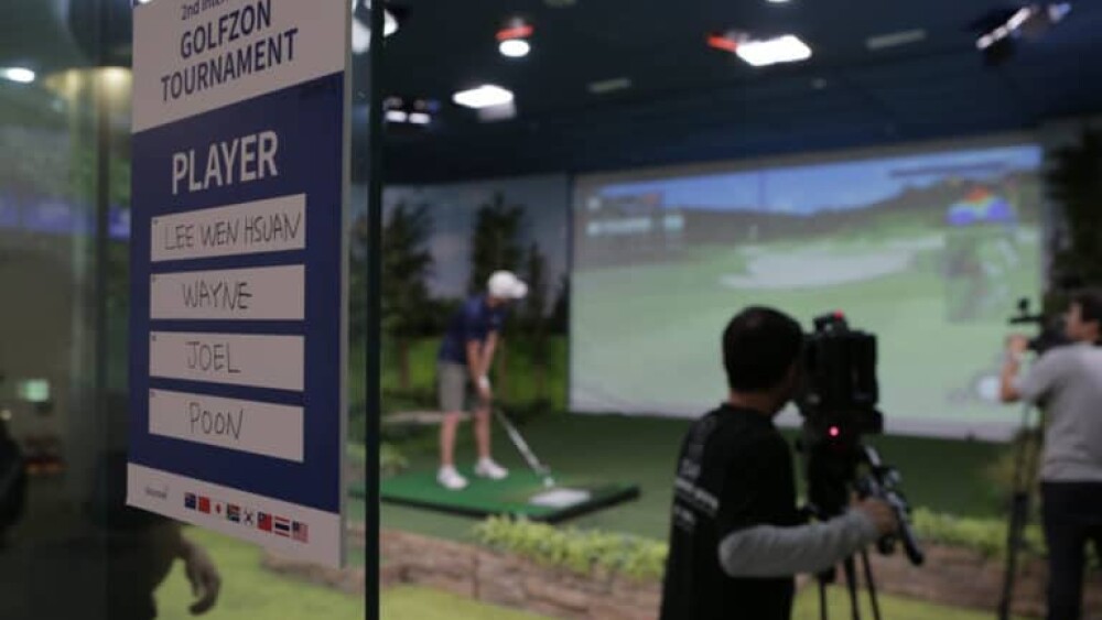 Camera Taping Player Playing on Golfzon Simulator - 3rd International Golfzon Tournament