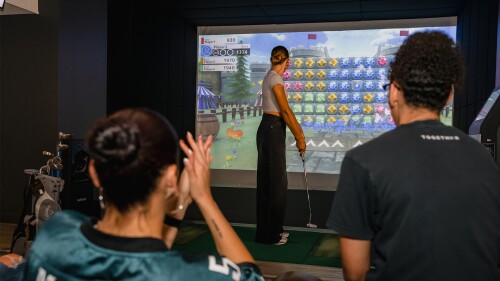 Playing arcade at GOLFZON Social