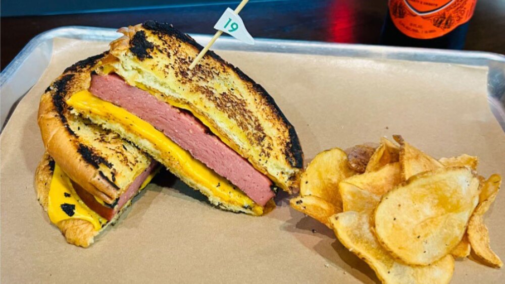 The 19th Hole in Boaz, Alabama - Sandwich with Potatoes and Octoberfest Drink in Background